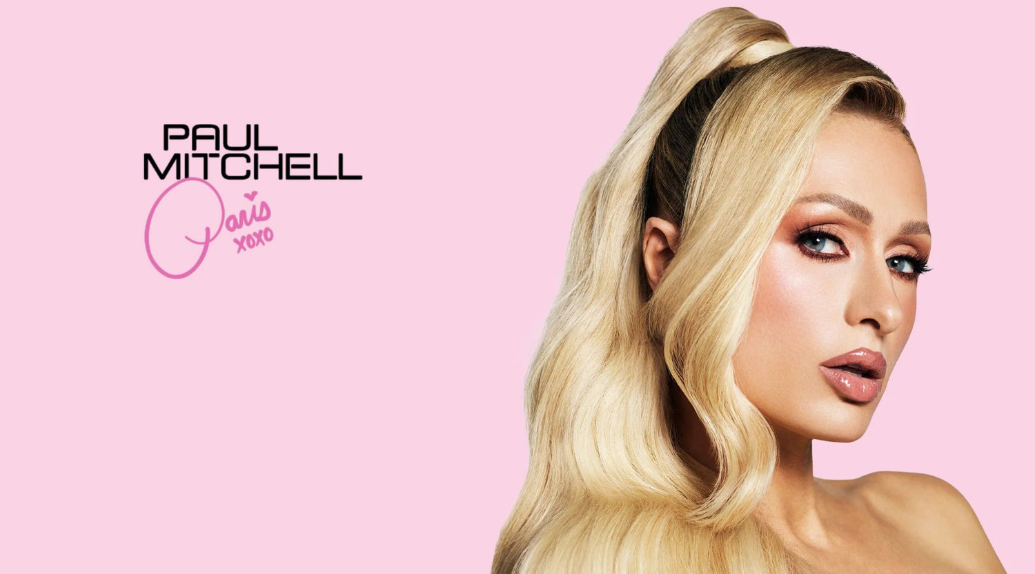 Paris Hilton mit glamourösem High-Ponytail und Paul-Mitchell-Styling.